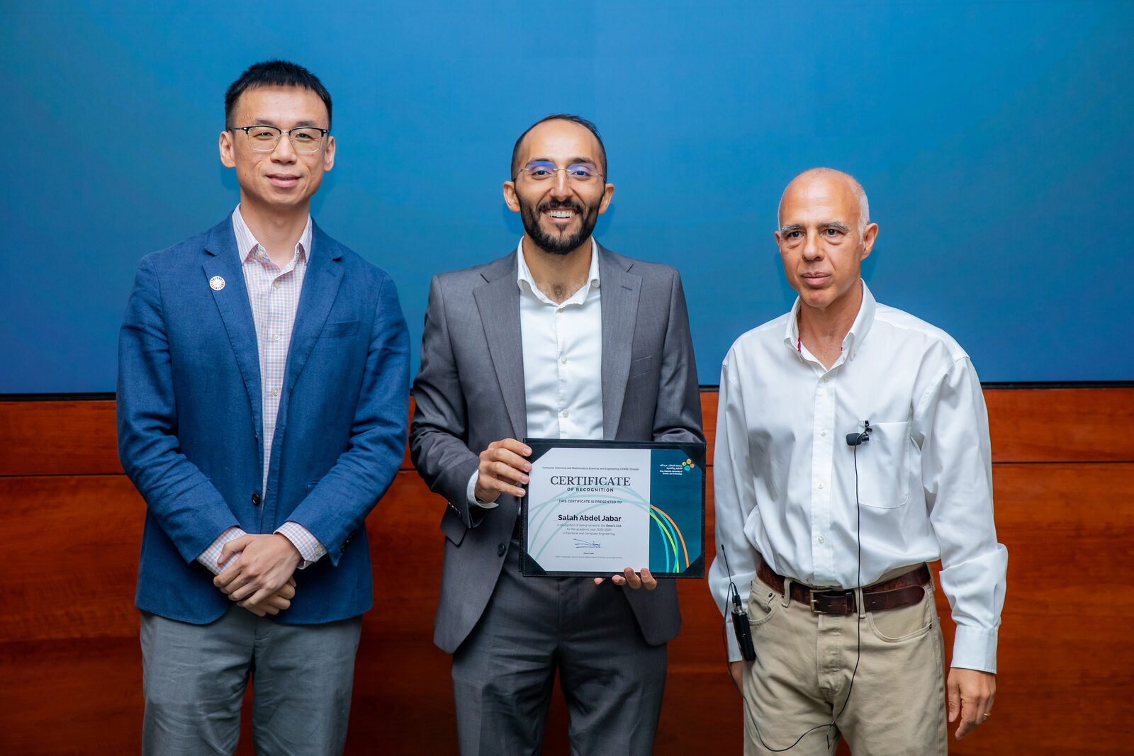 Receiving the CEMSE Dean's List certificate at the 2025-2026 ceremony